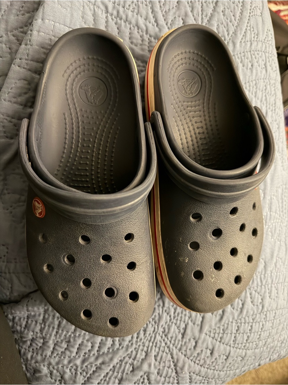 CROCS Men’s Black Clogs with Red and White Midsole Stripe